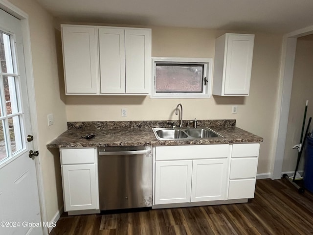 kitchen featuring white cabinets, stainless steel dishwasher, dark wood-type flooring, and sink