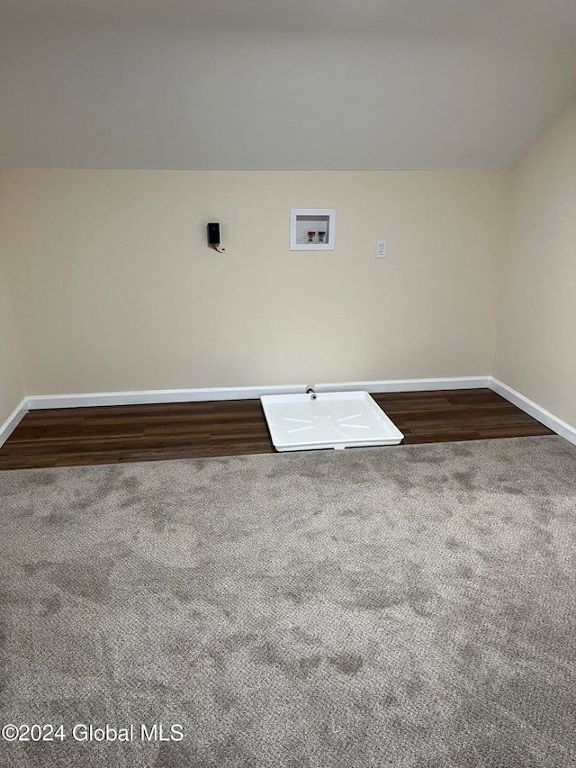 laundry room with dark wood-type flooring and washer hookup