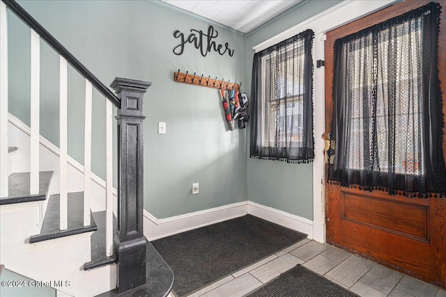 foyer with ornamental molding