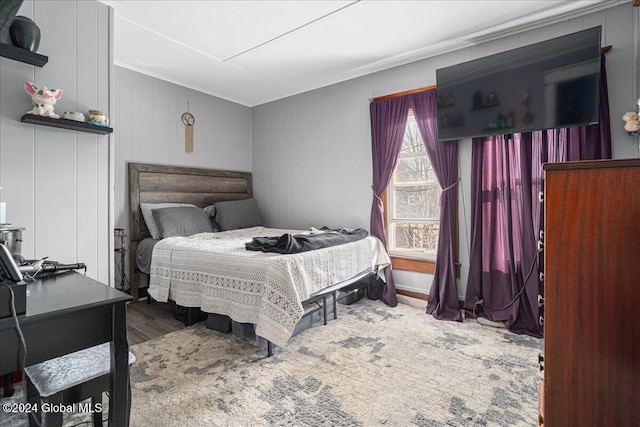 bedroom featuring wood-type flooring