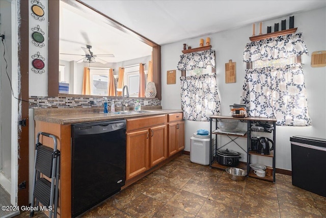 kitchen featuring tasteful backsplash, ceiling fan, sink, and black dishwasher