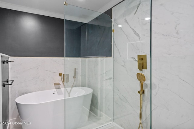 bathroom featuring shower with separate bathtub, ornamental molding, and tile walls