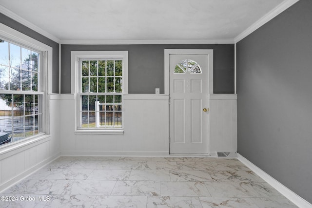 foyer with ornamental molding