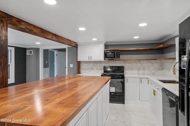 kitchen with white cabinets, backsplash, stainless steel appliances, and wooden counters