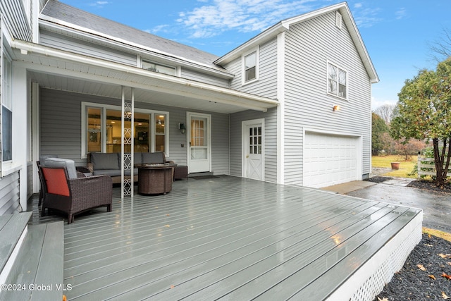 wooden deck featuring outdoor lounge area