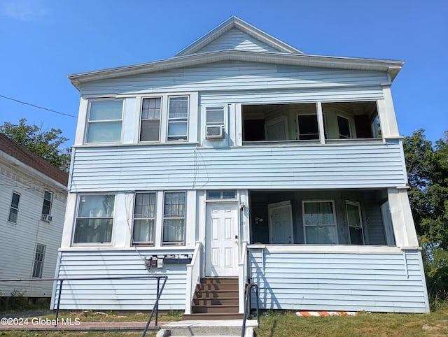 view of front facade with cooling unit