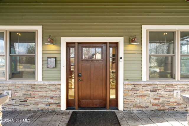 property entrance with a porch