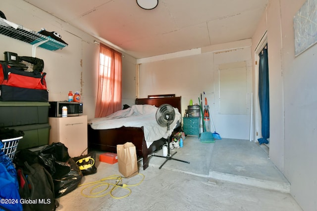 bedroom with concrete flooring