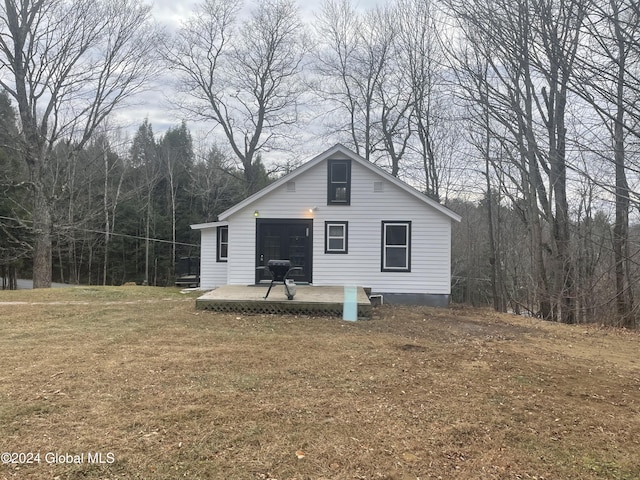 261 Fox Hill Rd, Edinburg, NY 12134 - view of property exterior with a yard and a wooded view