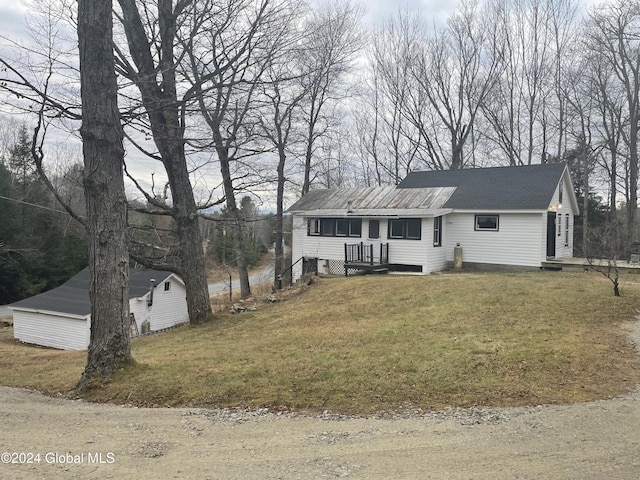 261 Fox Hill Rd, Edinburg, NY 12134 - single story home featuring a front yard and an outbuilding