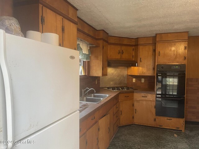 261 Fox Hill Rd, Edinburg, NY 12134 - kitchen with freestanding refrigerator, a sink, decorative backsplash, a textured ceiling, and gas cooktop