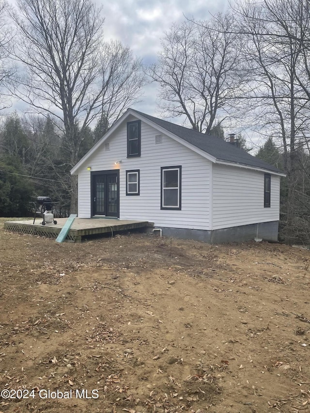 261 Fox Hill Rd, Edinburg, NY 12134 - back of house featuring a chimney and a wooden deck