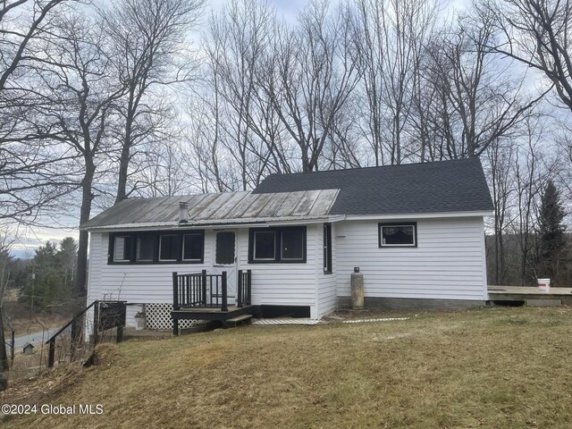 261 Fox Hill Rd, Edinburg, NY 12134 - ranch-style home with a front lawn and metal roof