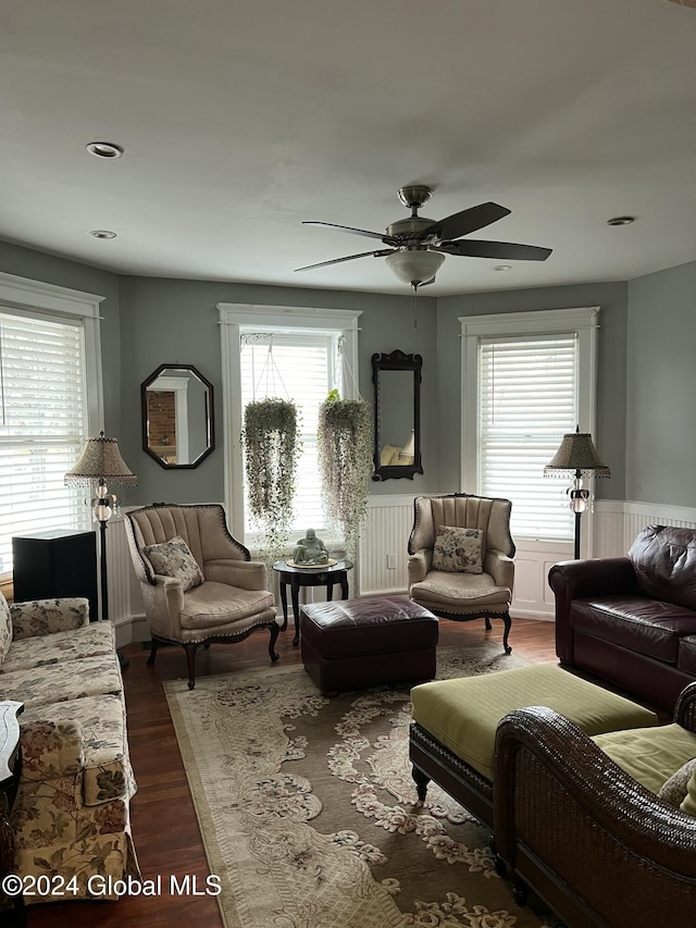21 Willett St, Fort Plain, NY 13339 - living room with wainscoting, a ceiling fan, and dark wood-type flooring