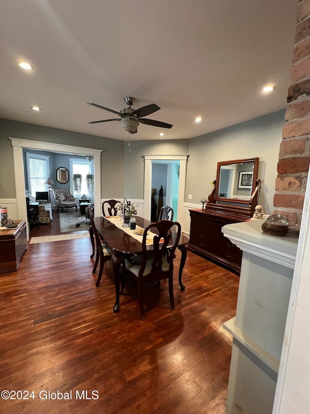 dining room featuring dark hardwood / wood-style floors and ceiling fan