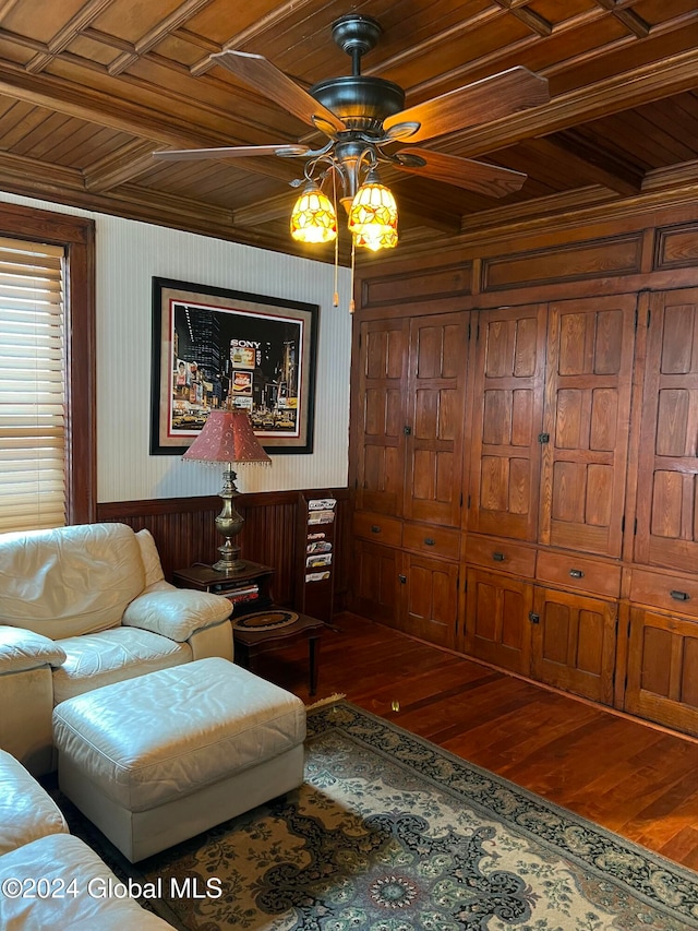 living room with ceiling fan, hardwood / wood-style floors, wooden ceiling, and wooden walls