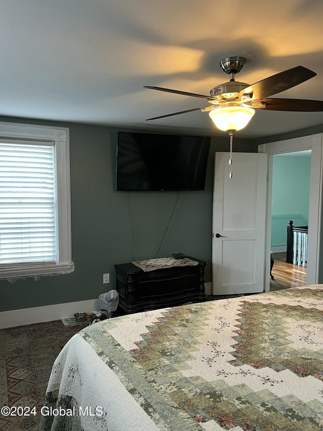 21 Willett St, Fort Plain, NY 13339 - bedroom with baseboards and ceiling fan