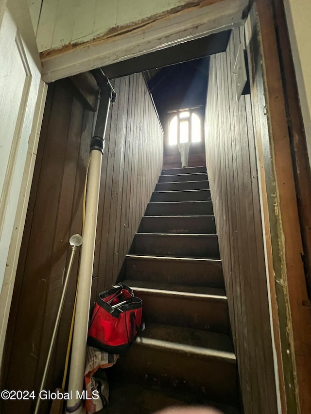 stairs with wooden walls