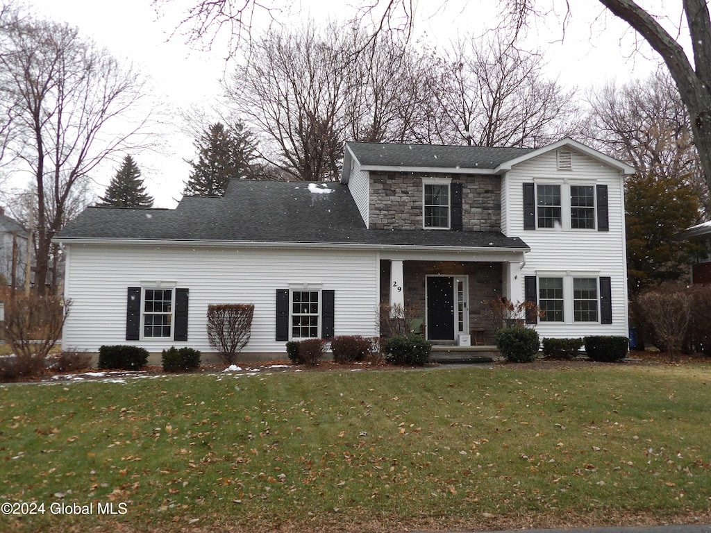 front of property with a front yard