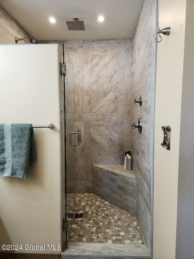 bathroom with an enclosed shower