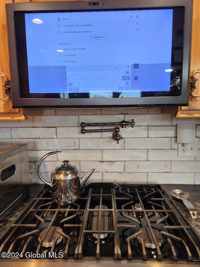 interior details featuring stainless steel cooktop