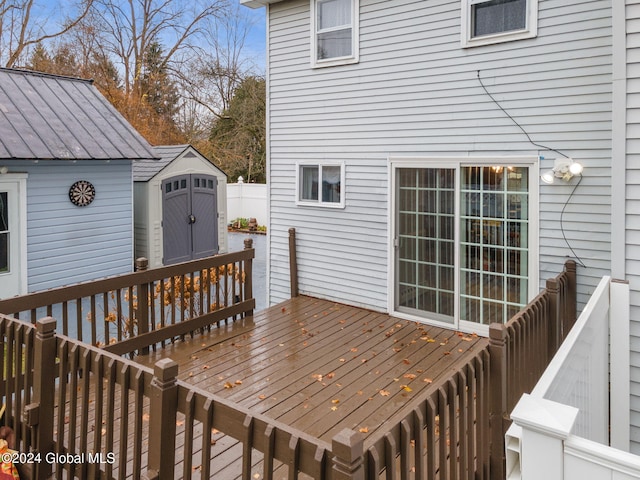 deck featuring a shed