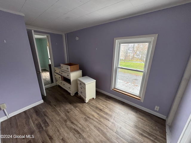 bedroom featuring dark hardwood / wood-style flooring