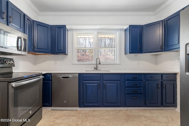 kitchen featuring crown molding, sink, blue cabinets, and appliances with stainless steel finishes