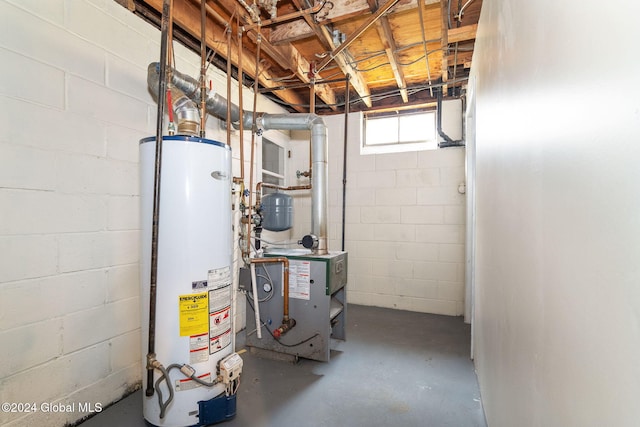 utility room featuring gas water heater