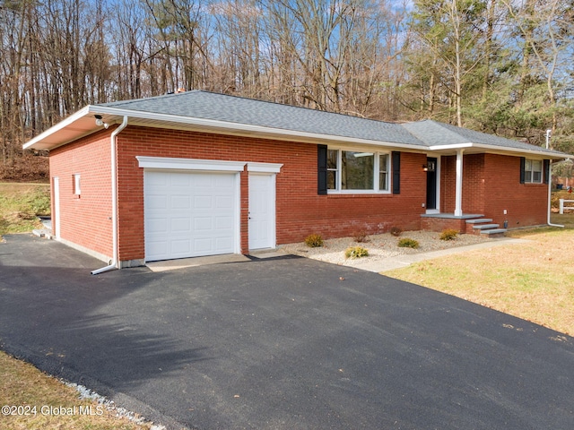 view of front of property featuring a garage