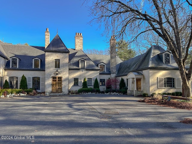 view of french country style house