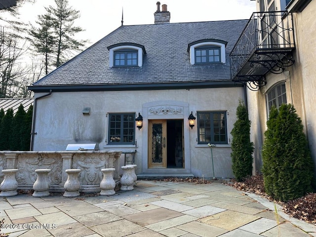 exterior space with a patio