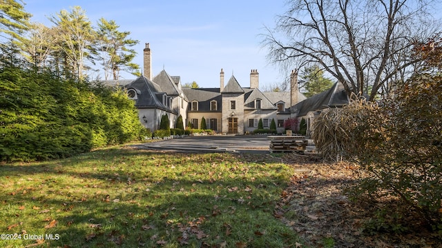 exterior space with a front yard