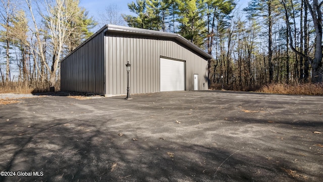 view of outdoor structure with a garage