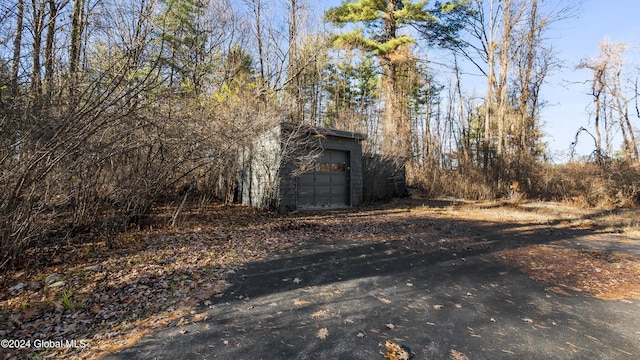 view of outbuilding featuring a garage