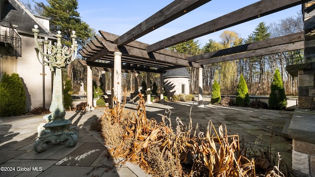 view of patio featuring a pergola