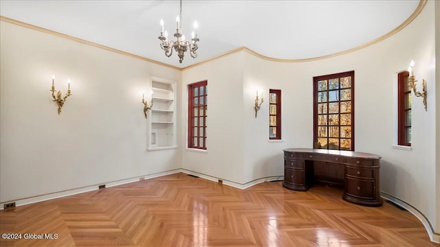 interior space featuring a chandelier, crown molding, and light parquet flooring