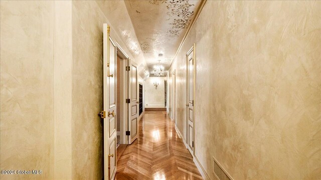 hallway with parquet flooring