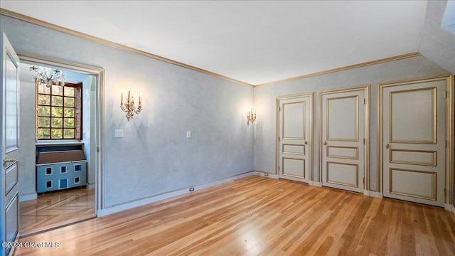 unfurnished bedroom with light wood-type flooring, crown molding, and vaulted ceiling