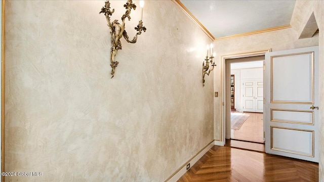 hall with parquet floors and crown molding