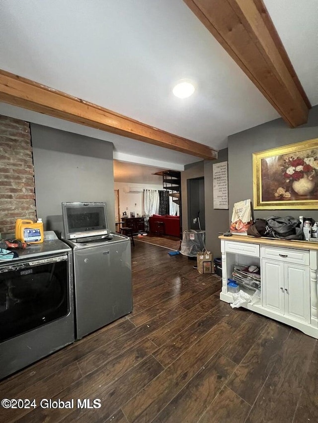 interior space with washing machine and dryer and dark wood-type flooring