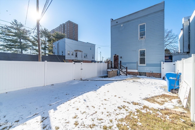 view of snow covered property