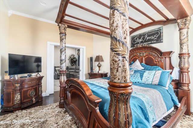 bedroom with hardwood / wood-style floors and ornamental molding