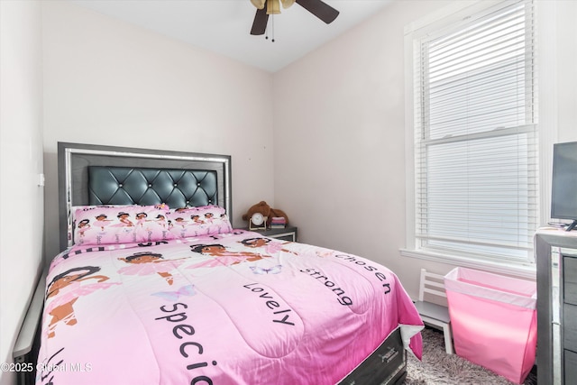 carpeted bedroom with ceiling fan