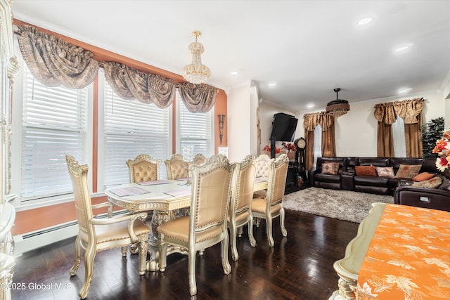 dining area featuring crown molding and dark hardwood / wood-style floors