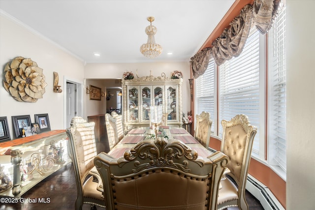 dining space with ornamental molding, an inviting chandelier, and a baseboard radiator