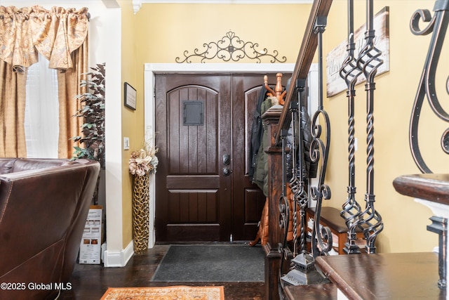 entrance foyer with dark hardwood / wood-style flooring