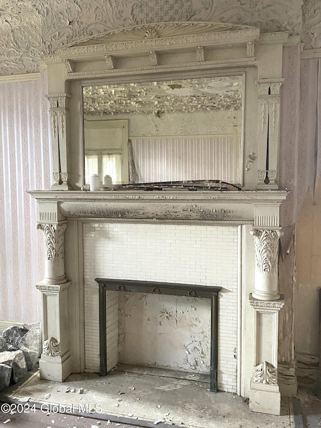 interior details featuring a fireplace