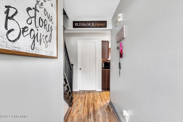 hallway featuring hardwood / wood-style floors