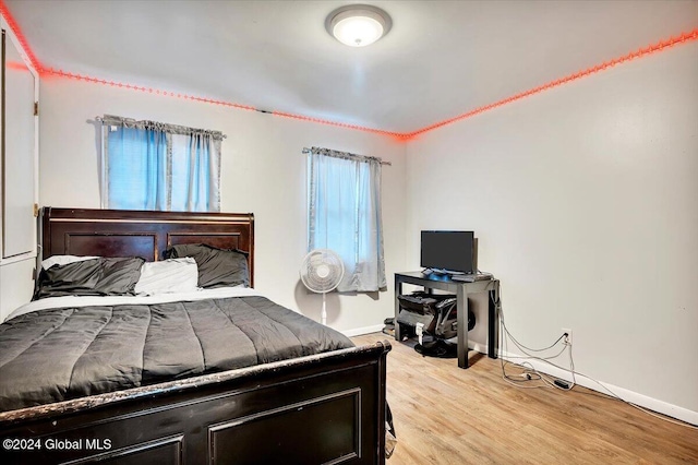 bedroom with light hardwood / wood-style floors